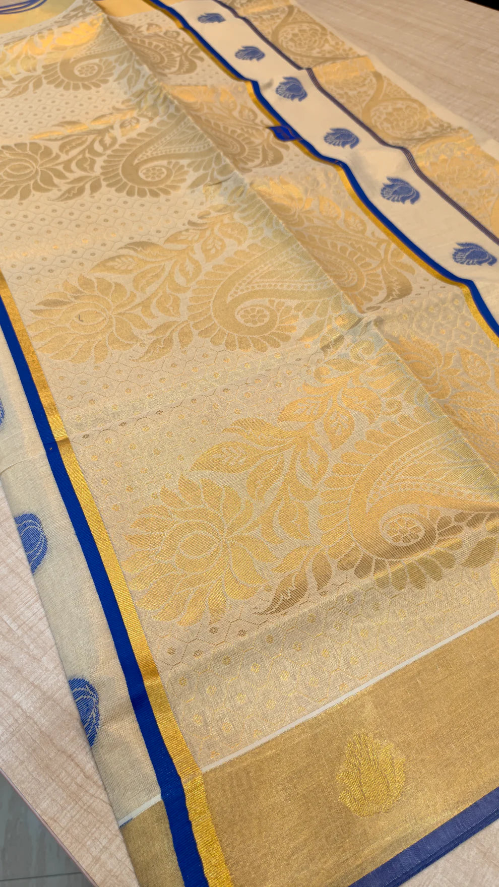 Blue Motif Kerala Tissue Saree